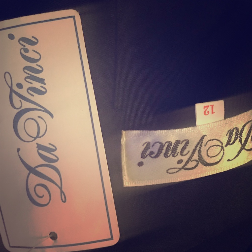 Knee length black corset top to flowing skirt